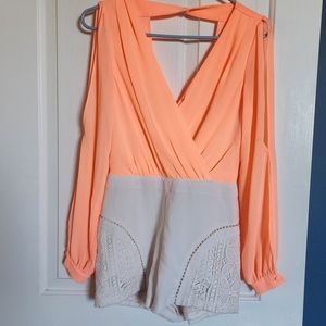 Gorgeous romper. Willy Jay's. Size S. Neon orange top and Ivory shorts.